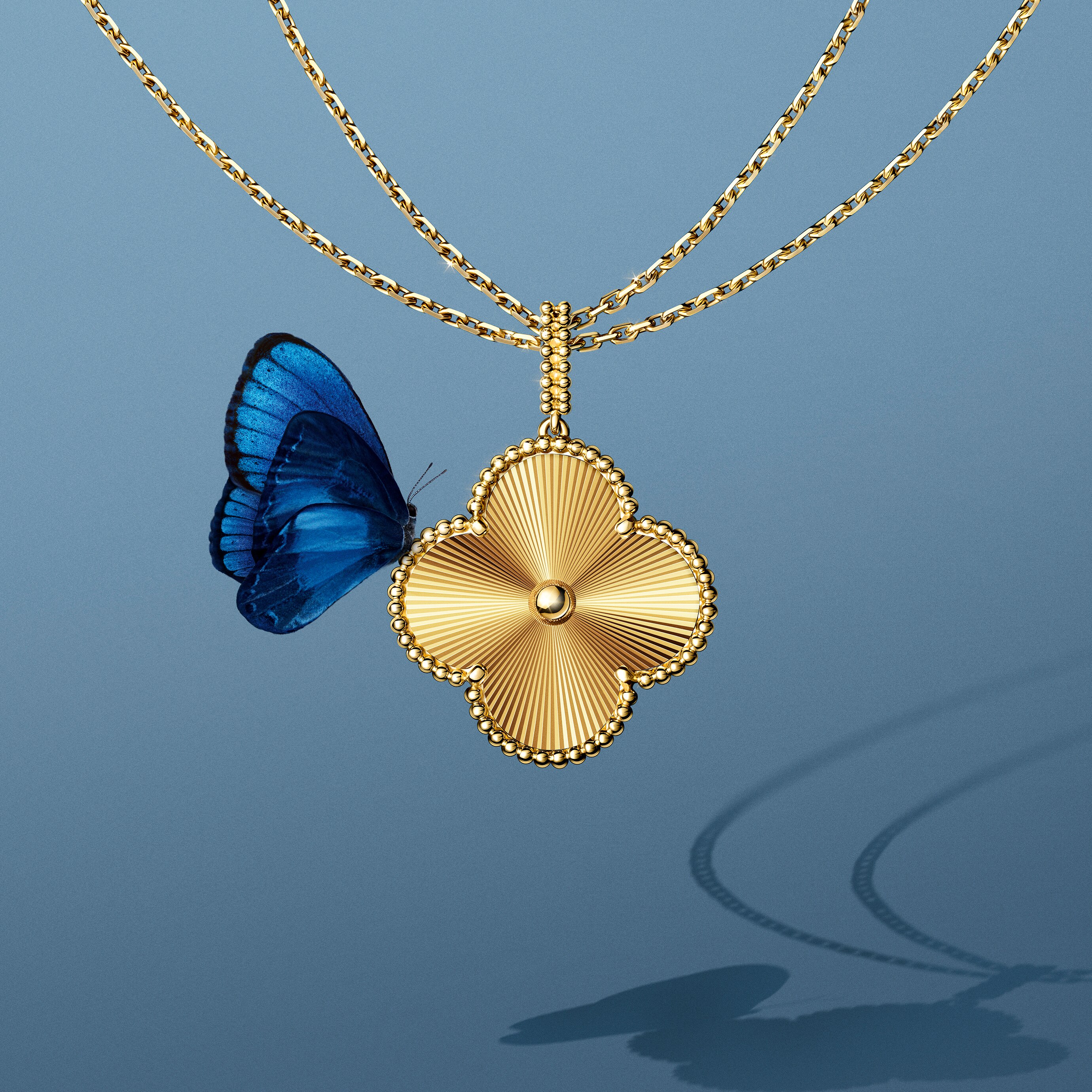 Magic Alhambra® long necklace, 1 motif, guilloché 18K yellow gold. Alhambra® collection, Van Cleef & Arpels.