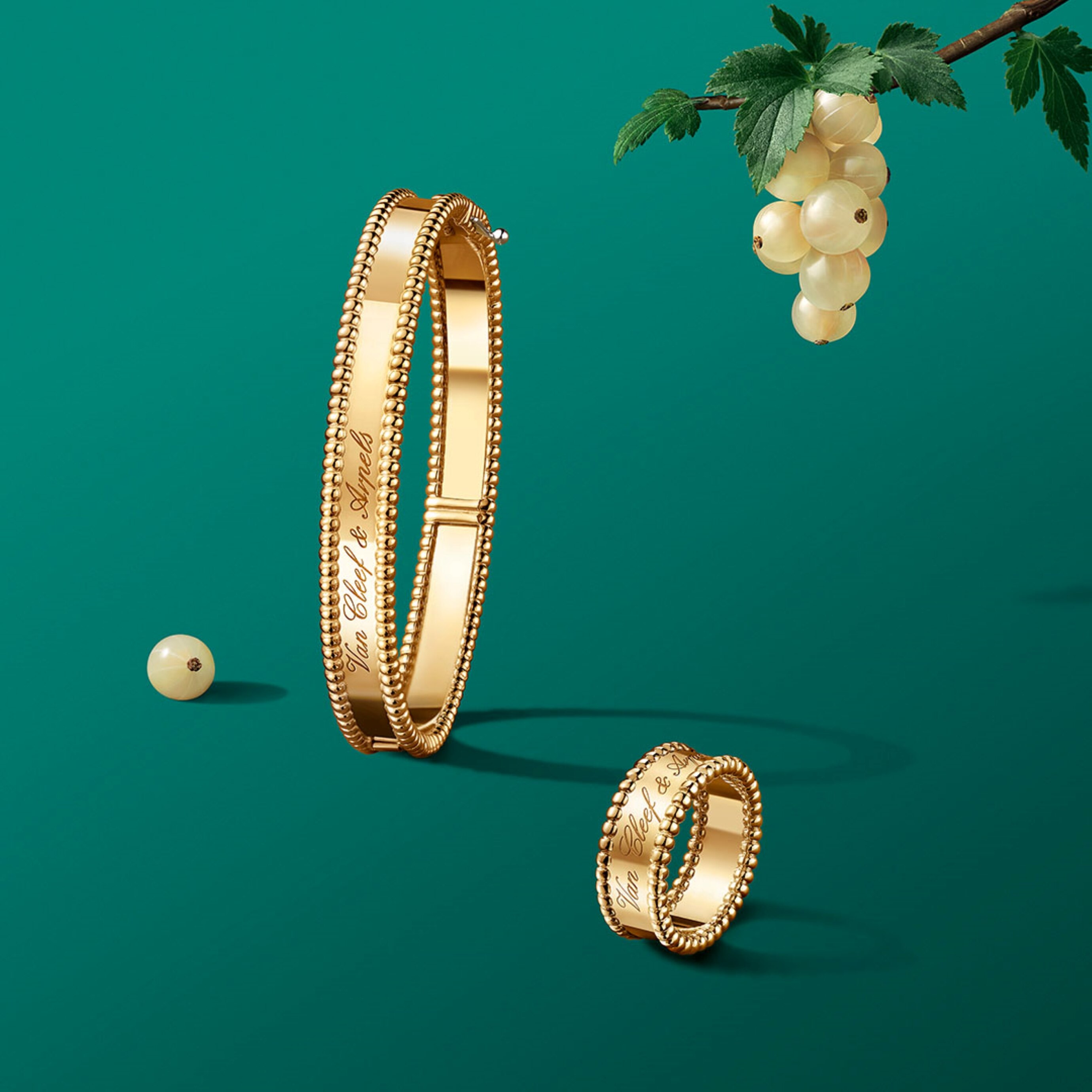 Perlée signature bracelet and ring, 18K yellow gold. Perlée® collection, Van Cleef & Arpels.